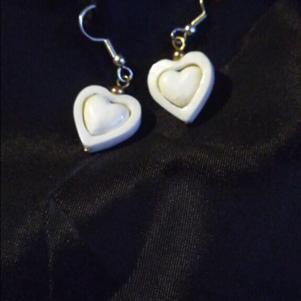 Mastadon ivory heart earrings